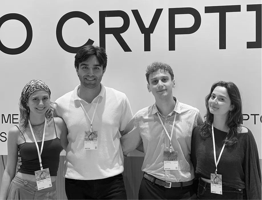Four node101 team members at a conference