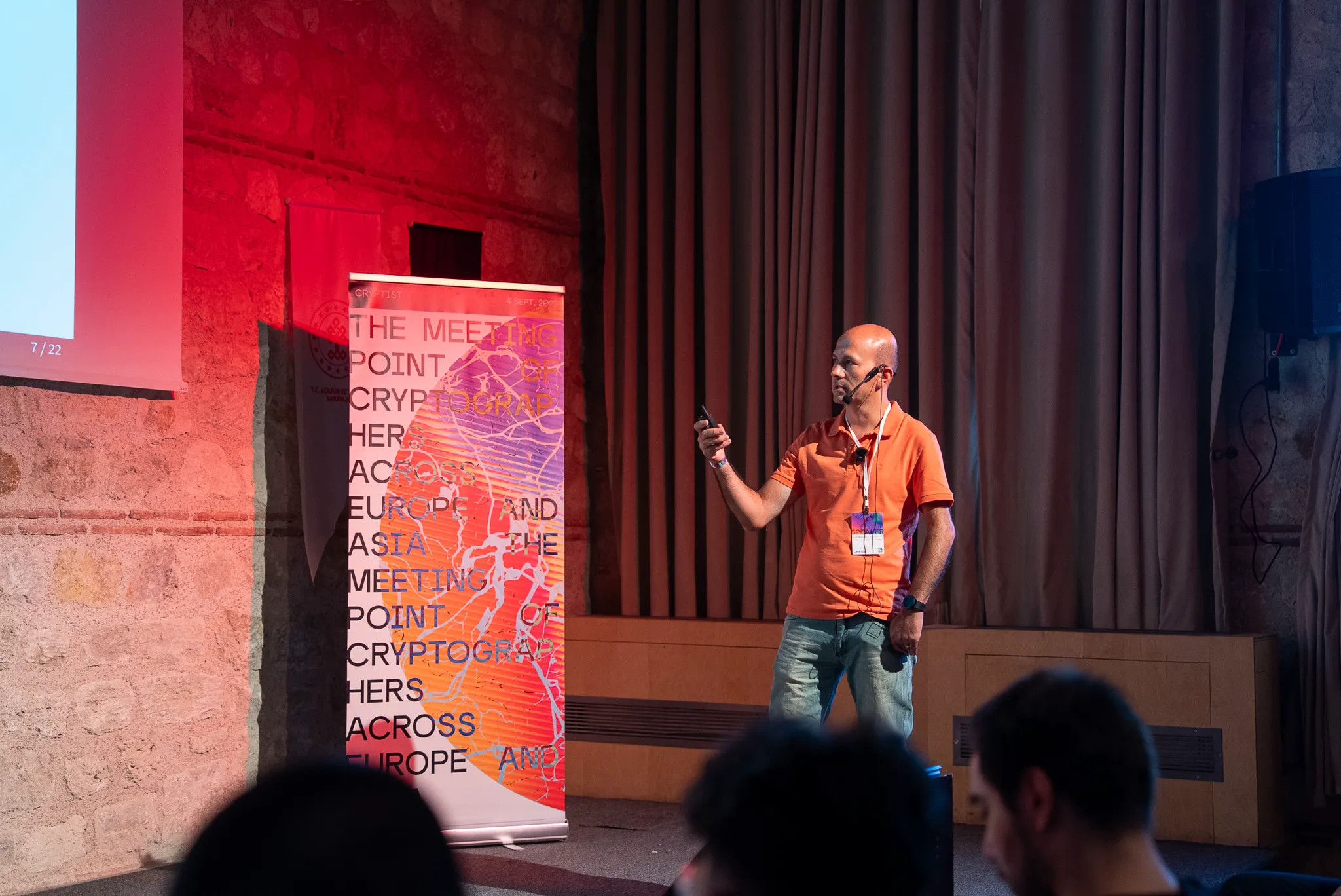 A speaker presenting at Cryptist 2025