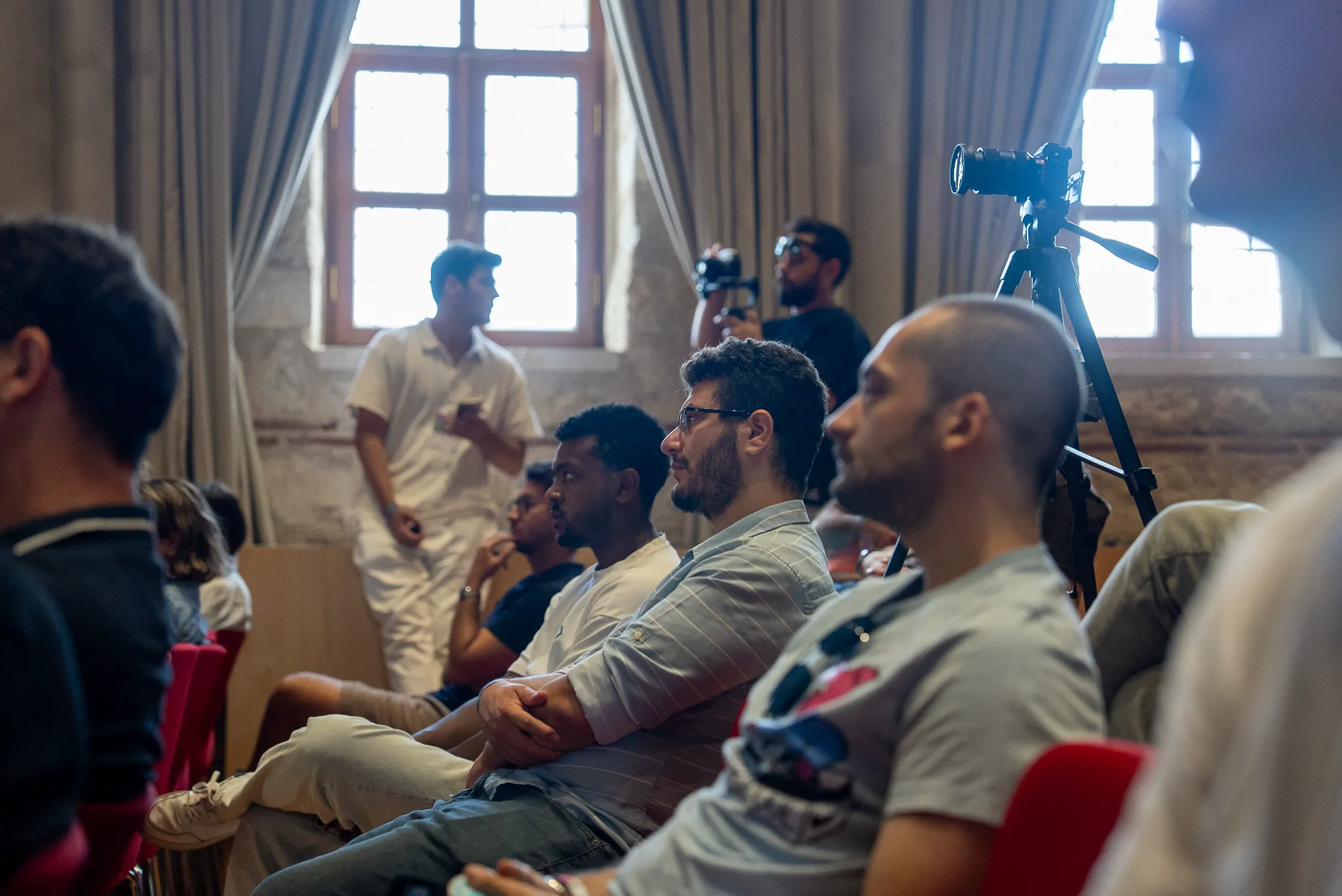 Audience watching a Cryptist 2025 presentation